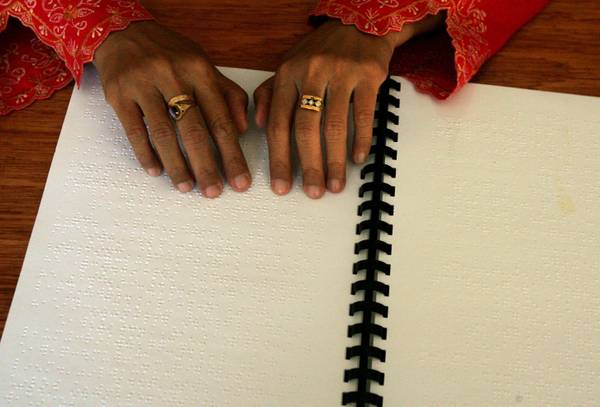 Blind People Read Koran in Braille