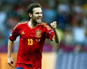 Spain's Mata reacts after scoring against Italy during their Euro 2012 final soccer match at the Olympic stadium in Kiev