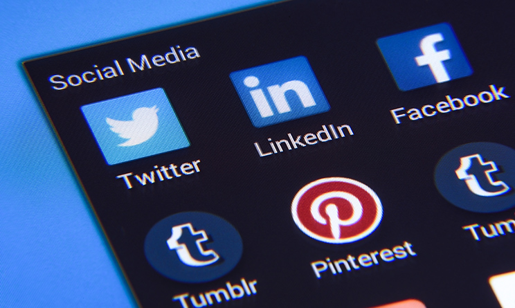 Krynica Poland - November 03, 2016 . Popular social media app isons: Twitter, LinkedIn, Facebook and other on smart phone screen close up.