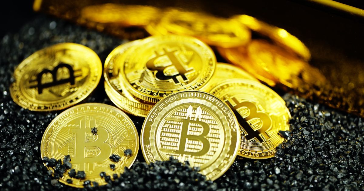 monete bitcoin d'oro