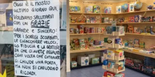Vetrine chiuse del negozio La Città del Sole davanti al Comune di Novara